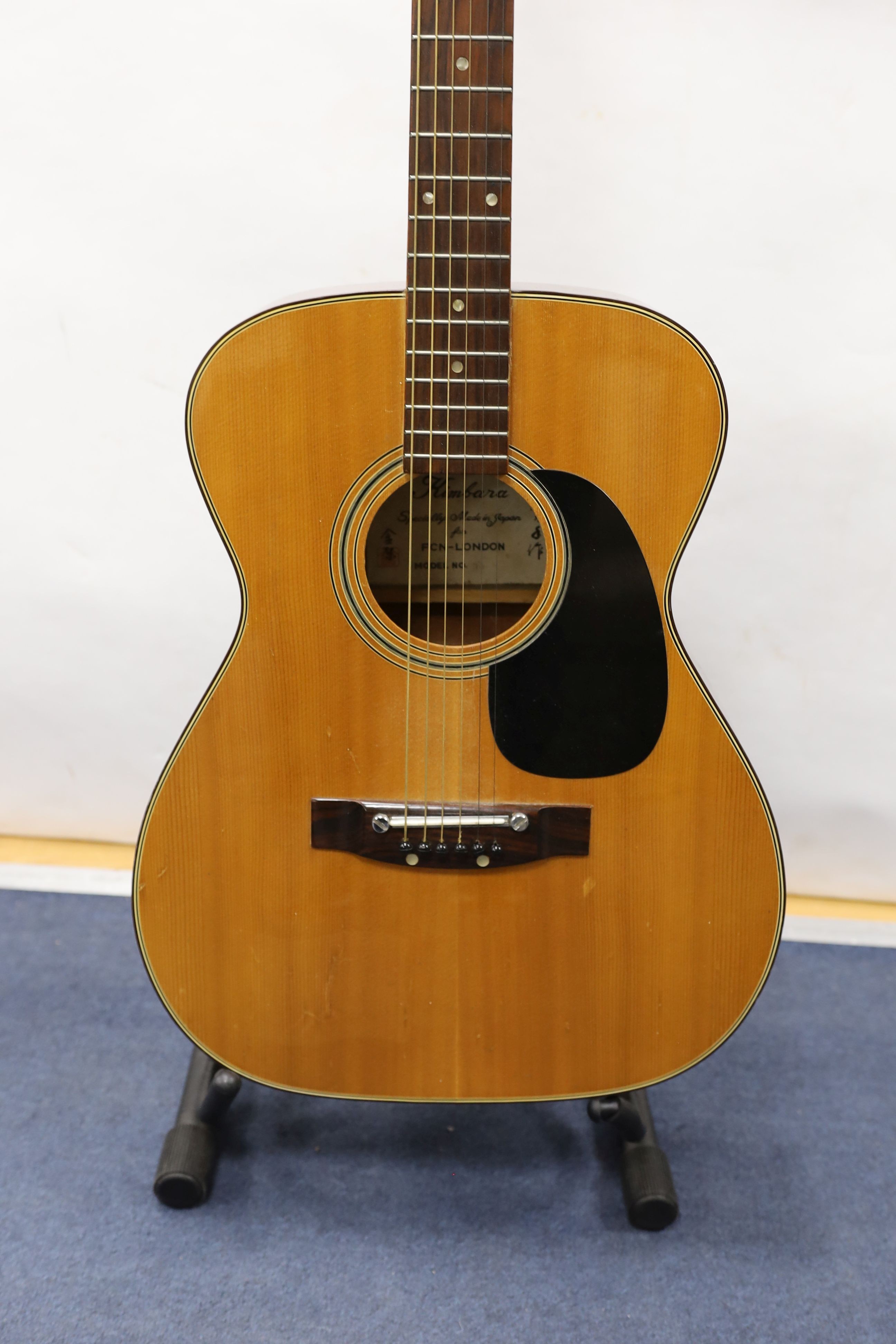 A Kimbala acoustic guitar.